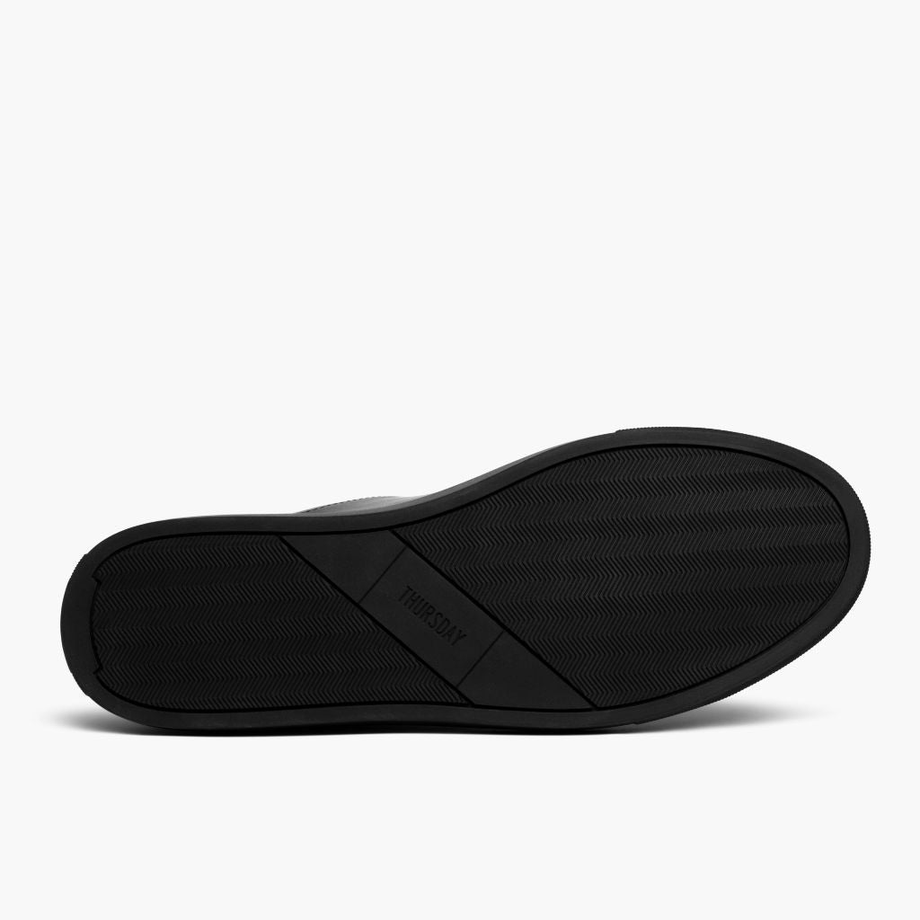 High-Traction Rubber Outsole & Lug Tread Pattern on Encore Jet ブラック レザースニーカー メンズ