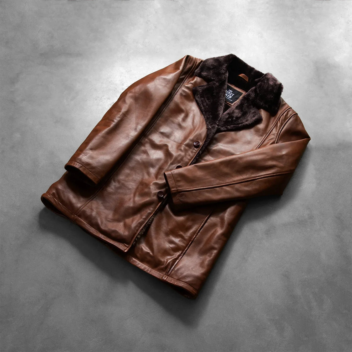 Open Hem &amp; Hem Craftsmanship Construction Detail on Men's Cinnamon Distressed Leather Fur レザーコート メンズ
