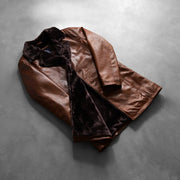 Styled Fit Perspective of Men's Cinnamon Distressed Leather Fur レザーコート メンズ on Model - Natural Daylight Drape