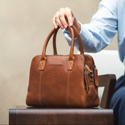 Styled Fit Perspective of Ezra Full-Grain Leather Handbag レディース on Model - Natural Daylight Drape