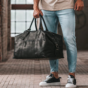 
Classic 100% Full-Grain Leather Duffle Bag - 補強レザーストラップと丁寧な縫製が際立つ背面ビュー