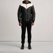 
Norman Tan Hooded Bomber Leather Puffer Jacket - 袖の立体カッティングと洗練されたテーパードフィットを見せる側面ビュー
